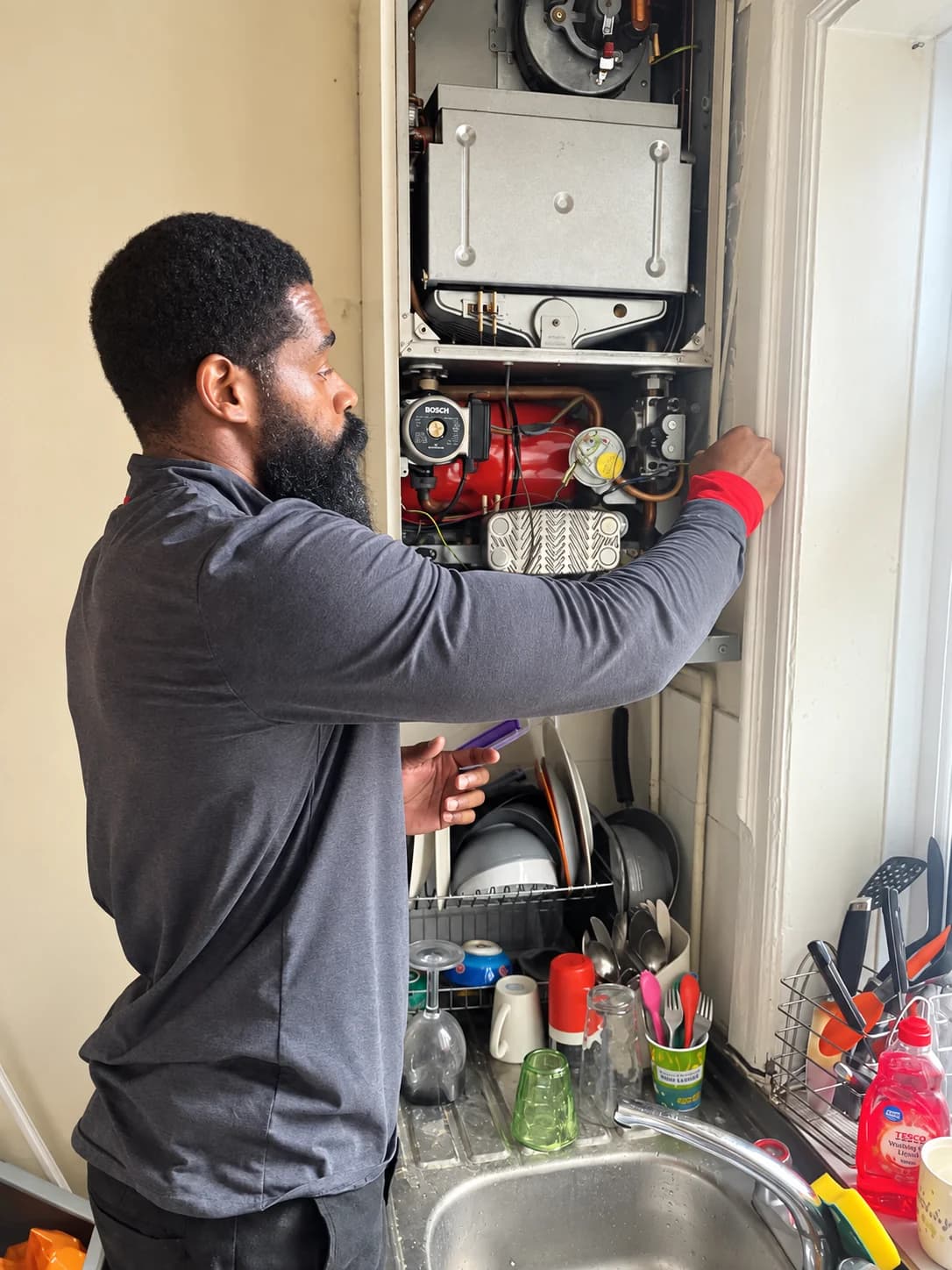 Simon Fuller working on an open boiler